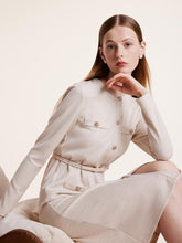 The dress is made of viscose fabric.